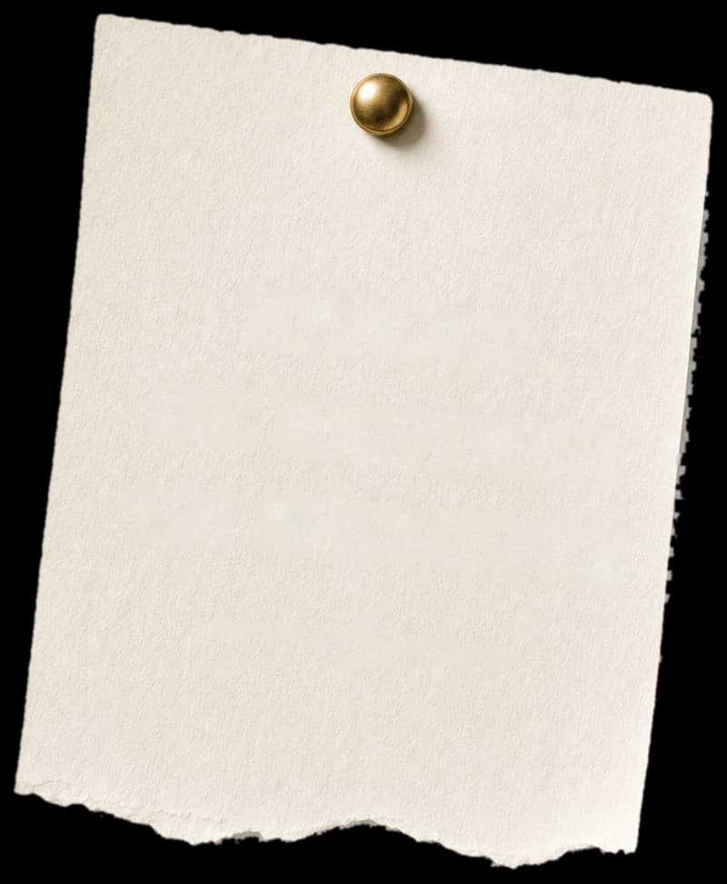 Étiquette en papier déchiré épinglée au mur par une punaise laiton